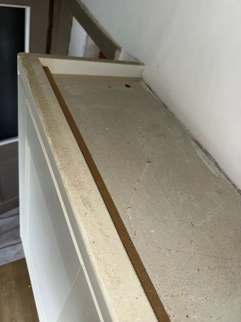 Dusty shelf before cleaning