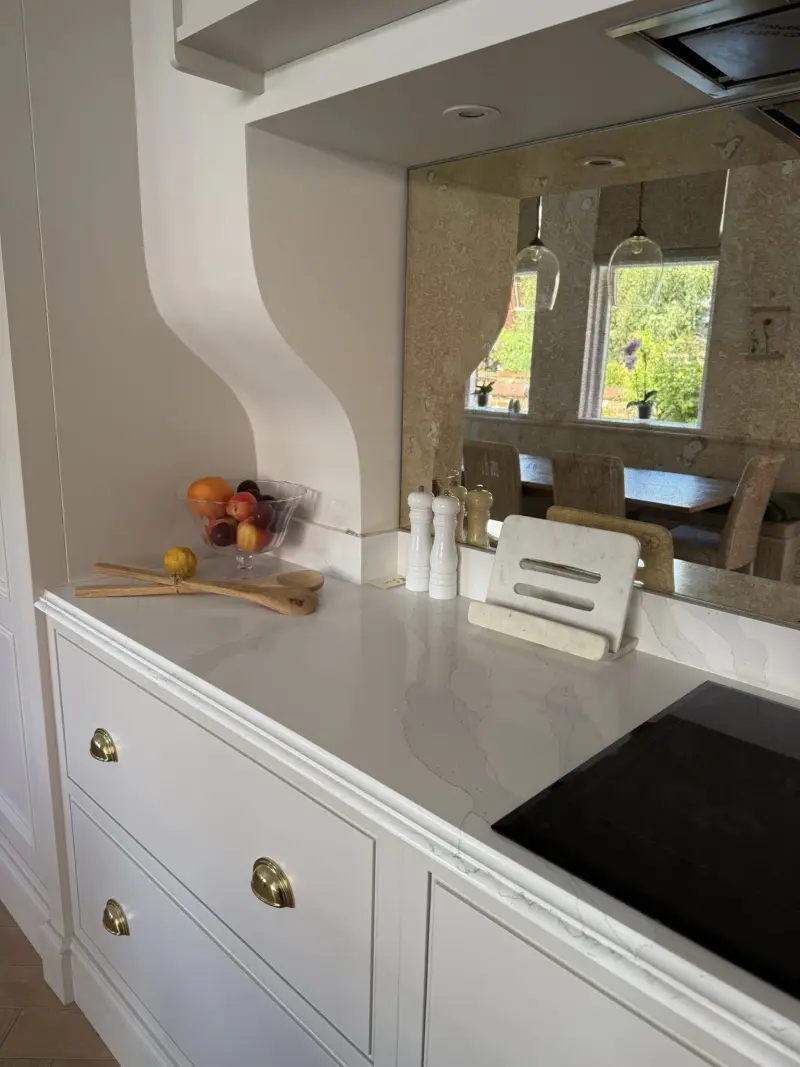 White kitchen with marble countertops after cleaning
